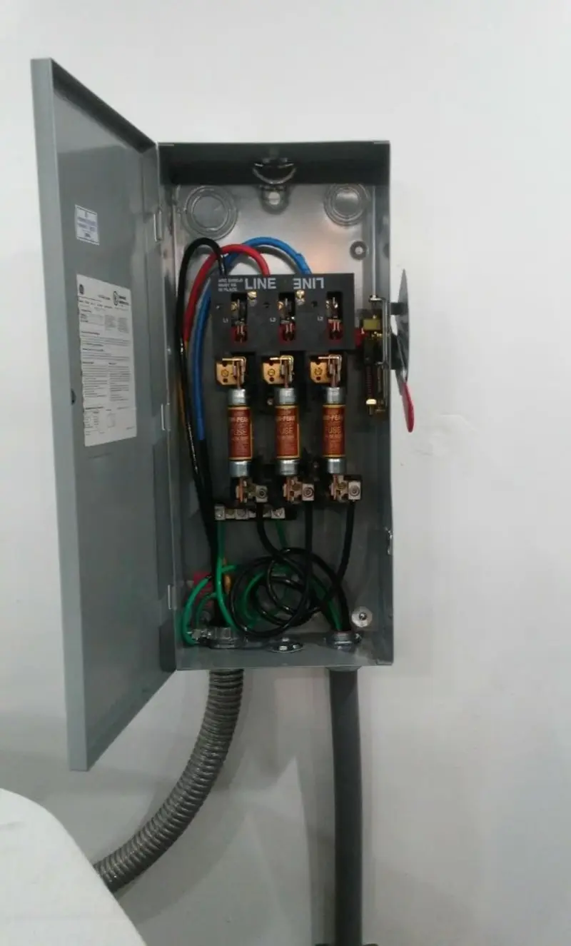 Three-phase disconnect switch installed for Smoke Detector Installation in Spring Lake