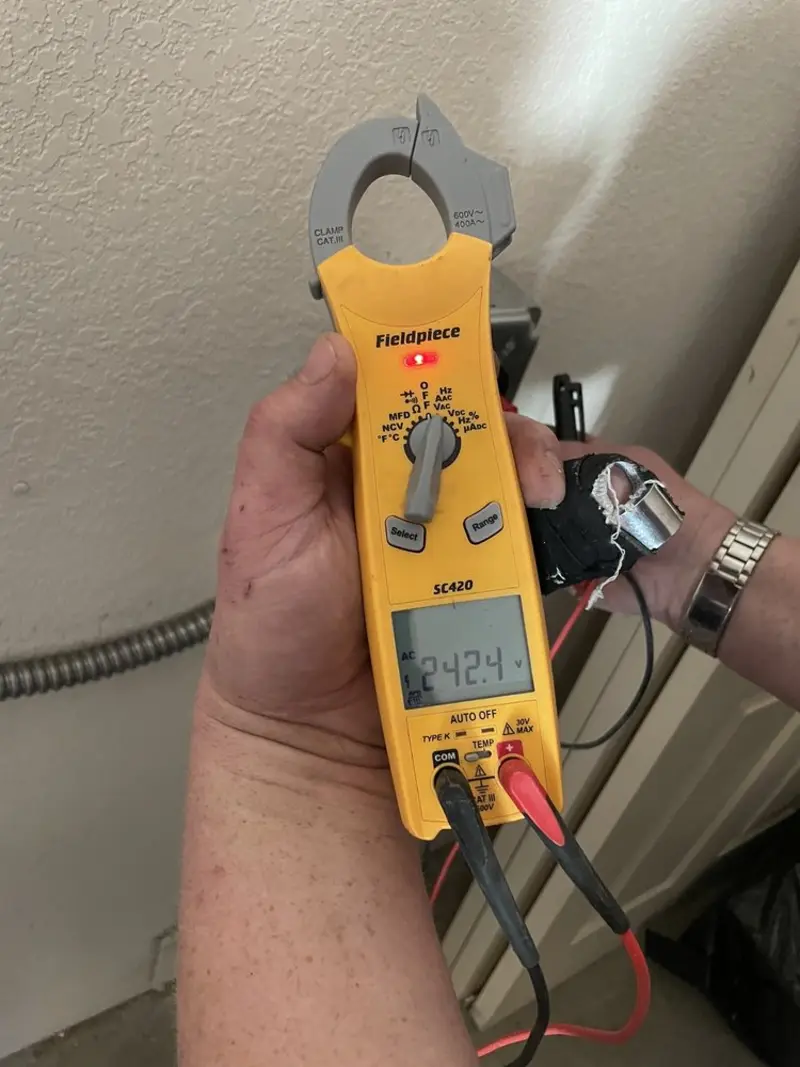 Voltage testing with clamp meter during Circuit Breaker Repair in Spring Lake